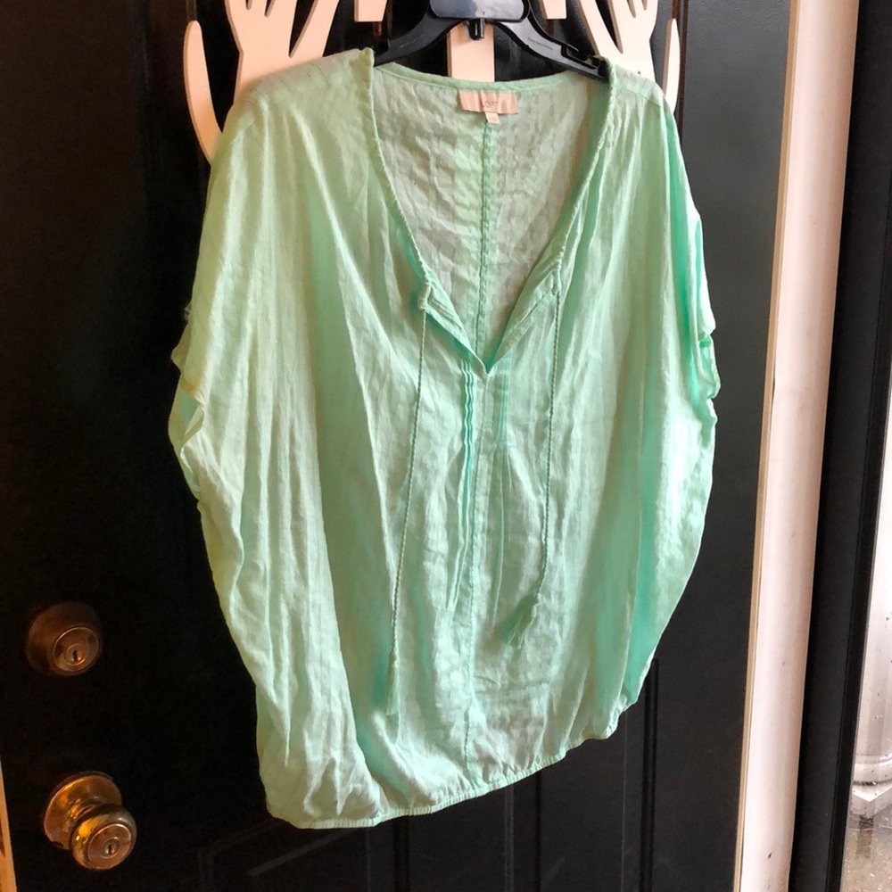 Loft top with tassels and elastic band on bottom